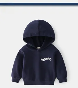 Detail of navy blue kids dinosaur hoodie featuring white ROAARR text and ribbed cuffs