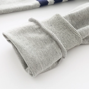 Kids grey athletic pants with soft knit fabric texture and rib-knit cuffs detail