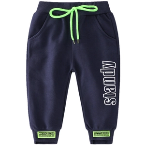 Kids navy joggers with neon green drawstring and standy print on white background