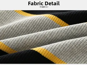 Close-up of color-block ribbed knit fabric in black, grey, and yellow for children sweater