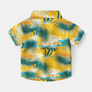 Kids yellow short sleeve Hawaiian shirt with tropical palm tree print and button-up collar