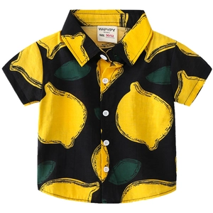 Short-sleeved black kids shirt with yellow lemon patterns and white buttons for summer