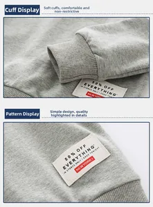 Detail view of ribbed cuffs and vintage patch on grey boys' sweatshirt