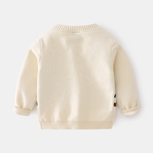 Back view of cream white knit sweater for boys featuring a classic ribbed round neck