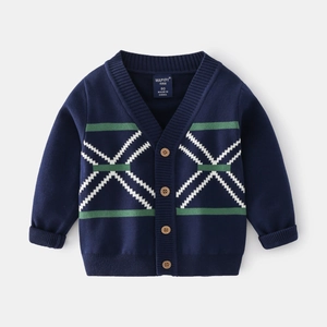 Close-up of kids V-neck cardigan with navy blue knit texture and geometric pattern