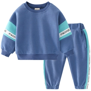 Blue kids sweatshirt and pants set with green side stripes and waffle knit texture