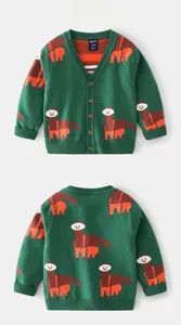 Detailed knit texture of green V-neck cardigan featuring cartoon alpaca pattern and wood buttons