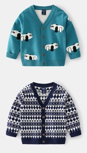 Close-up of kids v-neck cardigans with panda jacquard and geometric patterns and wood buttons