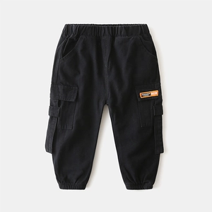 Kids black cargo jogger pants with elastic waist and orange label patch detail