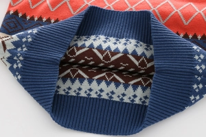 Detail of ribbed neckline on boys' thick jacquard sweater with geometric knit pattern