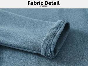 Close-up of gray-blue thermal fabric texture and double-stitch cuff detail on kids top