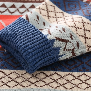 Boy's winter jacquard knit sweater with ribbed cuffs and geometric colorful pattern