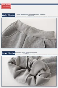 Detail view of winter grey toddler sweatpants showing thick fleece lining and elastic waist