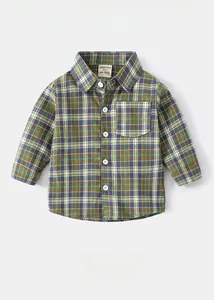 Flat lay of boys plaid long sleeve shirt made of soft washed cotton fabric