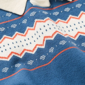 Maglione lavorato a maglia blu navy da bambino con onde arancioni e colletto polo