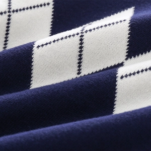 Navy blue and white argyle knit cardigan for boys with a soft textured finish
