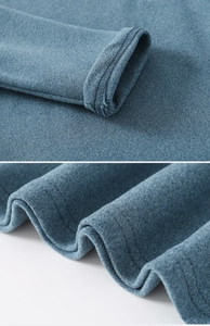 Detailed close-up of blue kids thermal shirt showing neat stitching and soft fabric