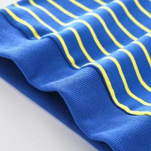 Close-up of blue and yellow striped knit fabric with durable ribbed cuffs for kids