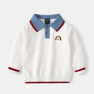 White knit polo sweater for boys featuring rainbow embroidery and striped ribbed cuffs