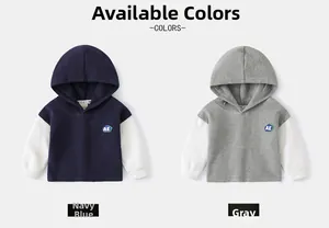 Détail du sweat à capuche pour garçon en maille gaufrée, couleurs bleu marine et gris