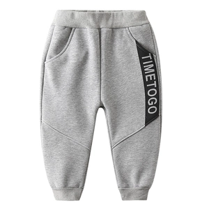 Kids grey fleece winter sweatpants with elastic waist and TIMETOGO side stripe detail