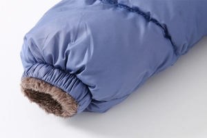 Detail view of winter coat elastic cuffs with thick brown fleece lining for wind protection