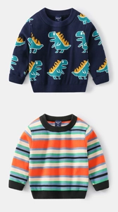 Detail of round neck knit sweaters with dinosaur patterns and colorful stripes for kids