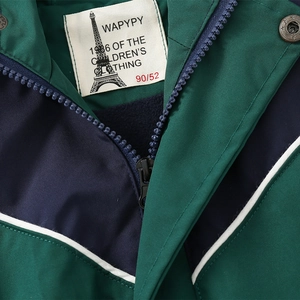 Kid hooded jacket with green and blue stitching detail and high-quality metal zipper