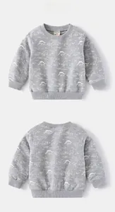 Front and back view of grey kids' sweatshirt with white dinosaur cartoon patterns