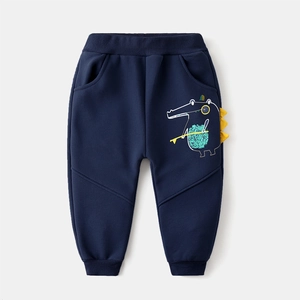 Dark blue kids fleece joggers featuring a 3D yellow dinosaur cartoon on the leg