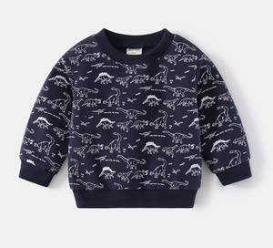 Detailed view of kids navy sweatshirt featuring all-over white dinosaur print patterns
