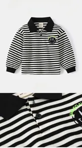 Detail of piqué cotton striped polo shirt featuring a black collar and smile patch