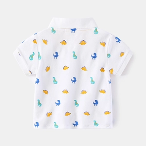 Boys white polo shirt with colorful dinosaur print, short sleeve summer tee back view