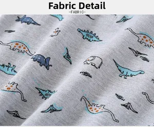 Close-up of breathable grey pique cotton fabric with colorful dinosaur patterns