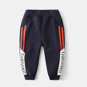Thickened boys winter fleece joggers in navy blue with orange stripes and Thriving print