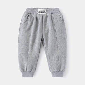 Kids sports sweatpants in light grey marl with elastic waist and woven text label