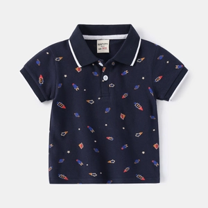 Close-up of boys polo shirt featuring space rocket prints and white contrast collar