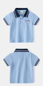 Detail of light blue kids Polo shirt with cat embroidery and striped ribbed collar