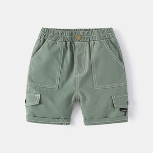 Detail of sage green cargo shorts with white contrast stitching and utility pockets