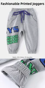 Détails du jogging gris pour enfant avec texture en coton, taille élastique et bas côtelé