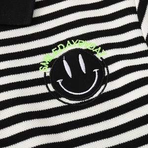 Children's striped polo sweatshirt with green Smile Day By Day embroidery detail