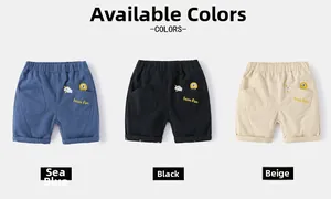 Détails de broderie sur short en coton avec trois couleurs et taille élastiquée