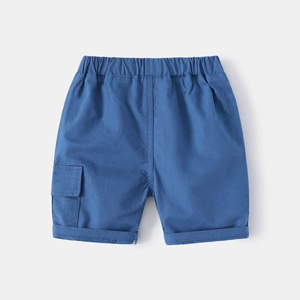 Detail of blue cotton cargo shorts for boys featuring elastic waist and flap pocket