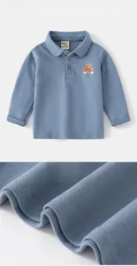 Detail of grey-blue long-sleeve polo shirt with bear embroidery and brushed texture