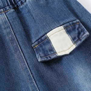 Classic blue denim shorts for boys featuring elastic waist and stylish flap pocket detail