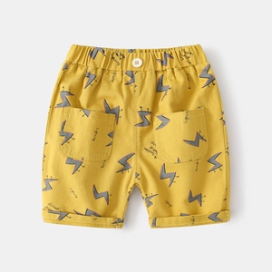Yellow kids cotton shorts with lightning print, elastic waist and side pockets