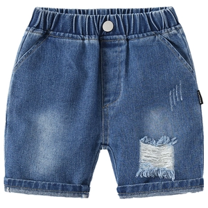 Boys distressed denim shorts with elastic waist and fashion label in mid-blue wash