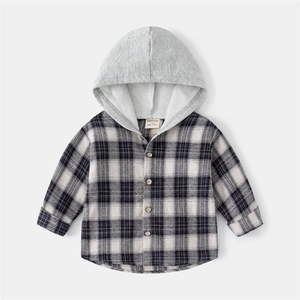 Detail view of cotton plaid shirt collar with grey hood and woven size label