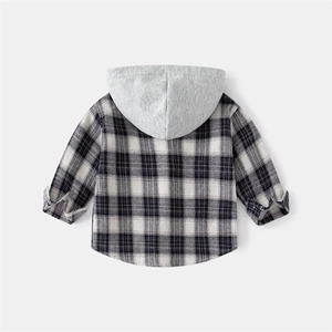 Detail of boys' plaid hooded shirt with black and white check and grey jersey hood