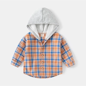 Kids orange and blue plaid hooded shirt with wooden buttons on a light grey background